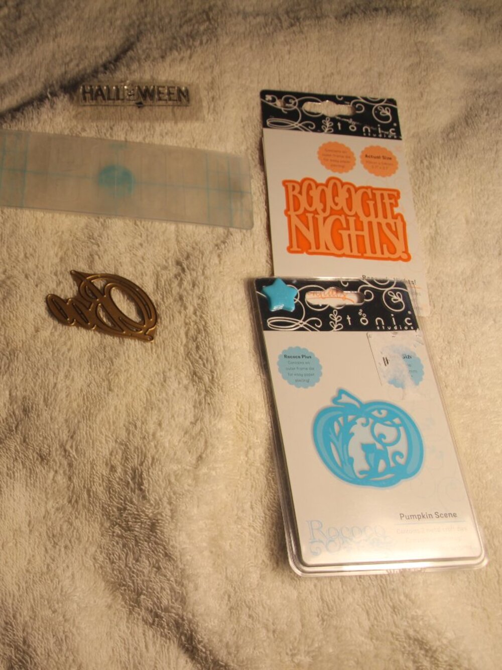 Halloween crafting supplies. Die sets and embossing folder. New to gently used.